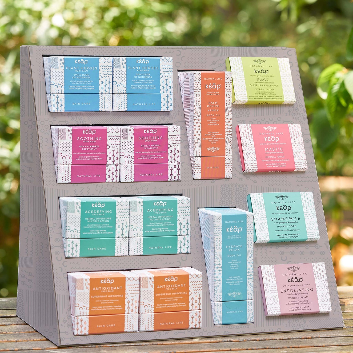 Grey stand with all Kear natural and waterless skincare products.