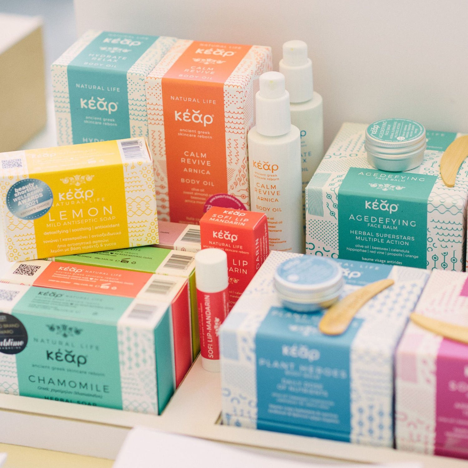 Collection of Kear natural skincare products on a white background.