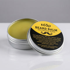 Texture of waterless Kear Beard Balm in aluminum jar.
