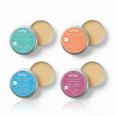 Set of Kear waterless travel size face and body balms.