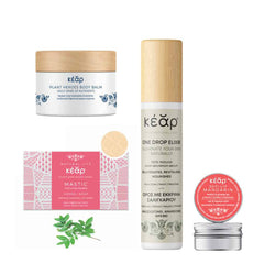 Kear natural skincare set with Plant Heroes waterless body balm, Mastic Herbal Soap, One Drop Elixir serum and SofiLip Mandarin natural lip balm.