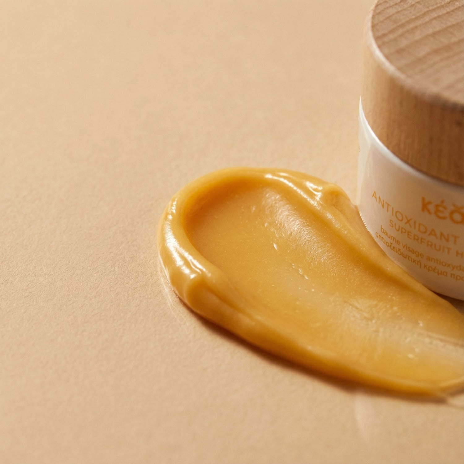 Texture of Kear waterless AntiOxidant face balm with seabuckthorn superfood.