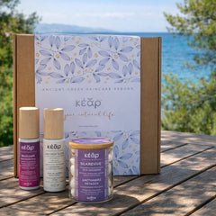 Closeup of Kear PHOS Ritual beauty set with Silk Revive silk cocoons, MiraCool Face, Eyes cream and One Drop Elixir Serum.